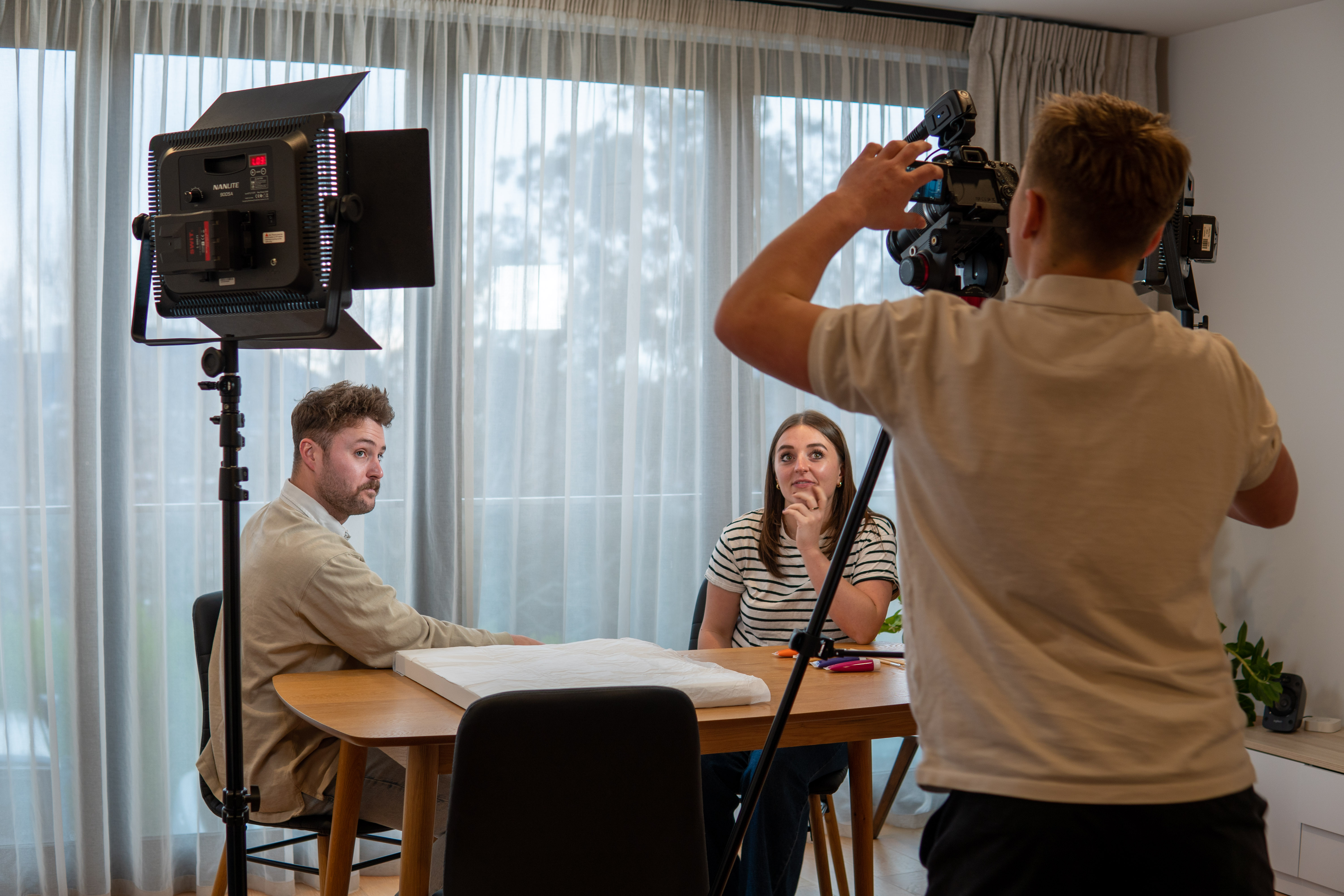 Jacob doing videography with two actors